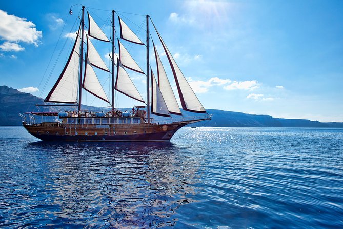 Santorini Caldera Sunset Sailing Cruise with Dinner and Wine - Sunset near Oia: the strongest part of the evening