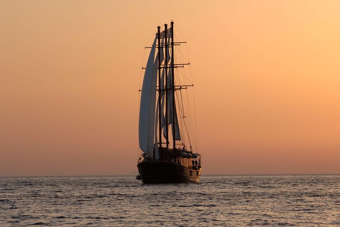Santorini Caldera Sunset Sailing Cruise with Dinner and Wine - Pickup, boarding, and the parts that need patience