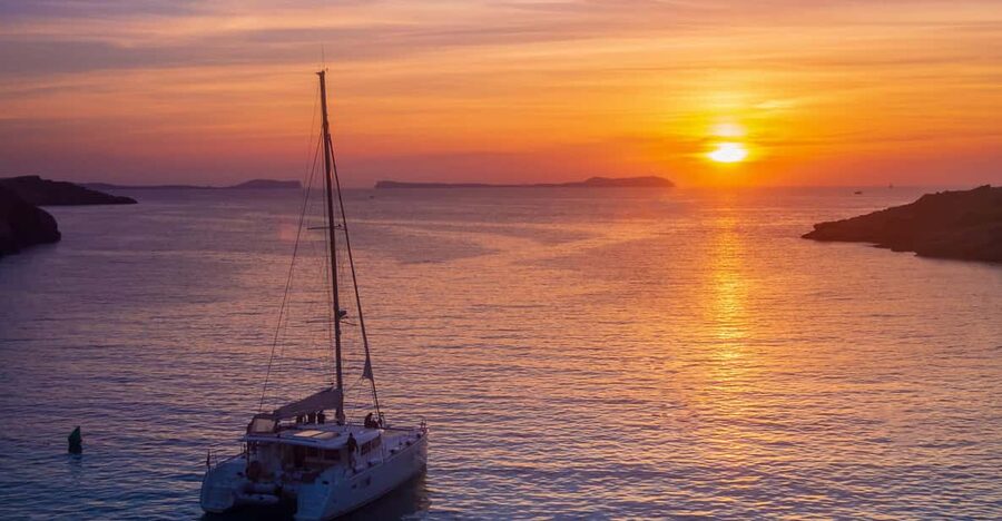 Santorini: Luxury Sunset Cruise with Dinner, BBQ, and Drinks - Mesa Pigadia is the first real swim stop
