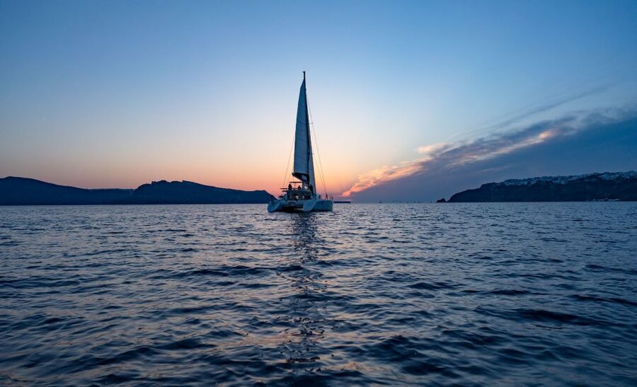 Santorini: Private Sunset Cruise with Dinner and Drinks - Crew style and the private-group advantage
