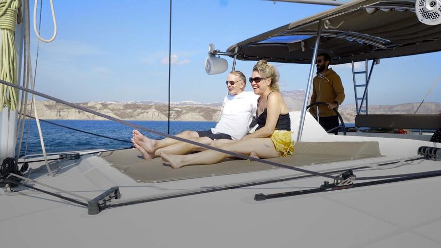 Santorini: Sunset Cruise with Greek Dinner and Transfer - Nea Kameni, Palea Kameni, and warm volcanic water
