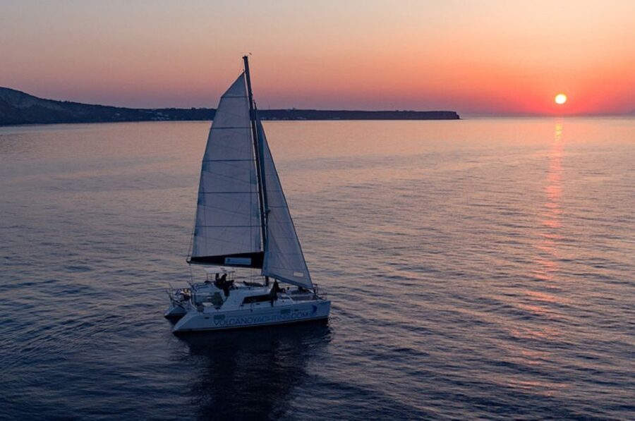Santorini: Sunset Cruise with Swim Stops, Dinner, and Drinks - Red Beach and the first swim