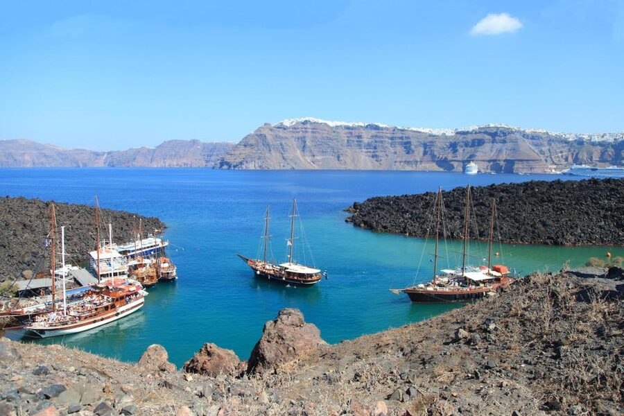 Santorini: Sunset Sailing Cruise, with Dinner and Drinks - Mesa Pigadia combines swimming and dinner