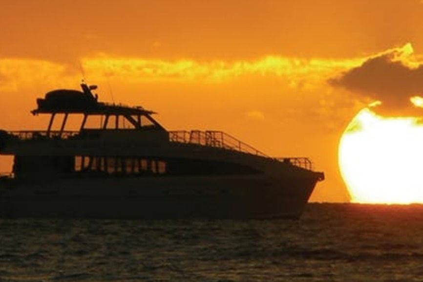 South Maui: Sunset Cruise with 4-Course Dinner and Drinks - Maalaea, dinner service, and the open deck
