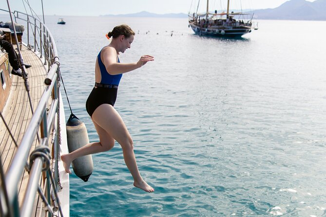 Sunset Dinner Cruise: Sunset, Swim, Drinks, and Dinner Onboard - Dinner cooked while you sail