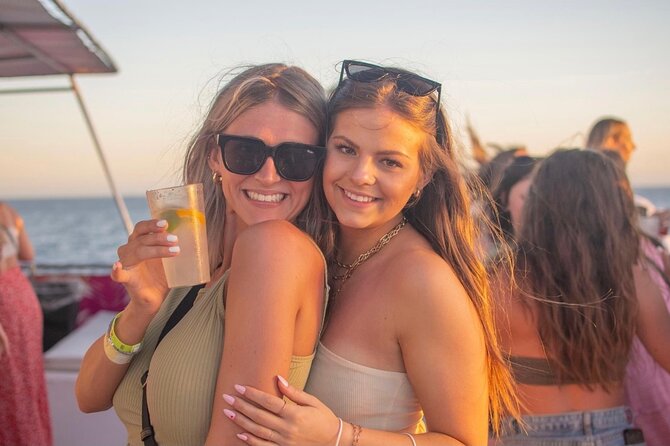 Sunset Dinner Cruise with Tequila & tacos - Boarding a 100-foot, two-level catamaran