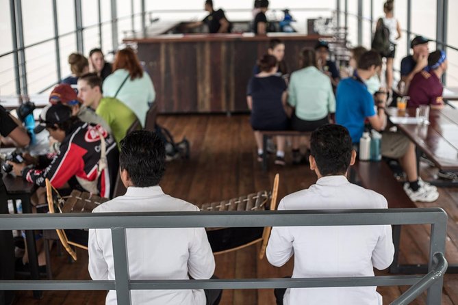 Sunset & Evening Dinner Cruise With One Way Free Pick Up - Returning past the skyline after dark