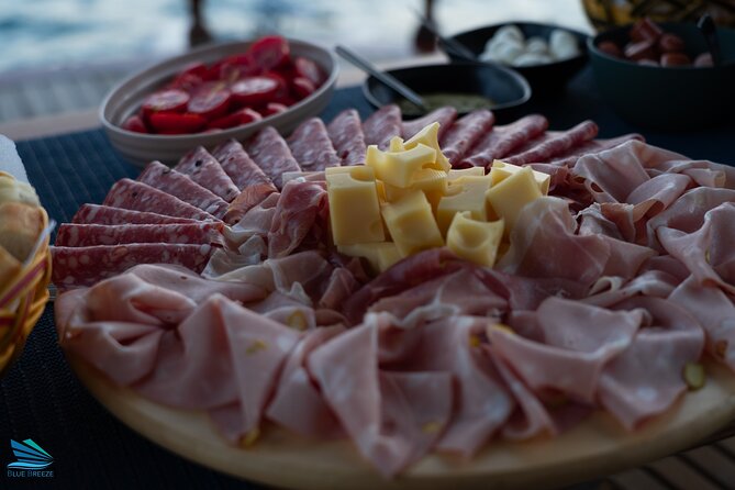 Tour of Apericena at Sunset and Dinner on Boat - Dinner in front of Portovenere