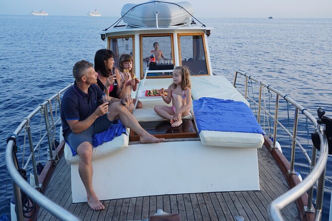 Tour of Apericena at Sunset and Dinner on Boat - The return to La Spezia with music and limoncino