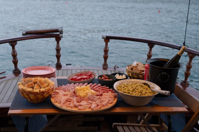 Tour of Apericena at Sunset and Dinner on Boat - Leaving Porto Mirabello and crossing the Gulf of Poets
