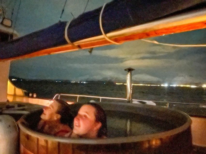 Tromso: Luxury Northern Lights Cruise with Hot Tub & Dinner - The hot tub, snow, and northern lights